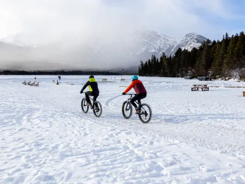 Jasper Alberta fatbiking couple on Pyramid Lake Paul Lavoie SnowSeekers
