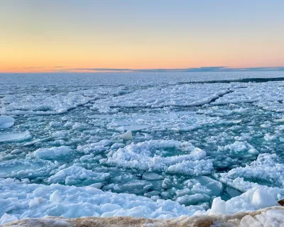 frazil pans (also know as pancake ice) form on a lake