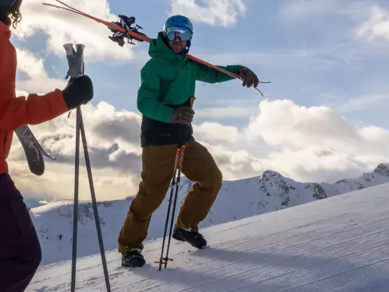 two skiers enjoying a bluebird day at Marmot basin
