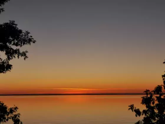 A photo of a sunset on Cold Lake