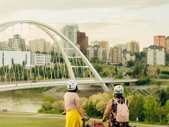 Biking to a view of the North Saskatchewan River and downtown Edmonton from Walterdale Hill, Edmonton, AB.