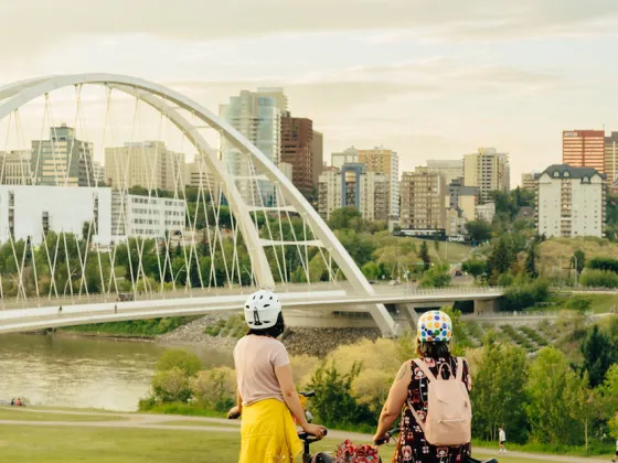 Biking to a view of the North Saskatchewan River and downtown Edmonton from Walterdale Hill, Edmonton, AB.