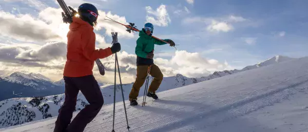 two skiers enjoying a bluebird day at Marmot basin