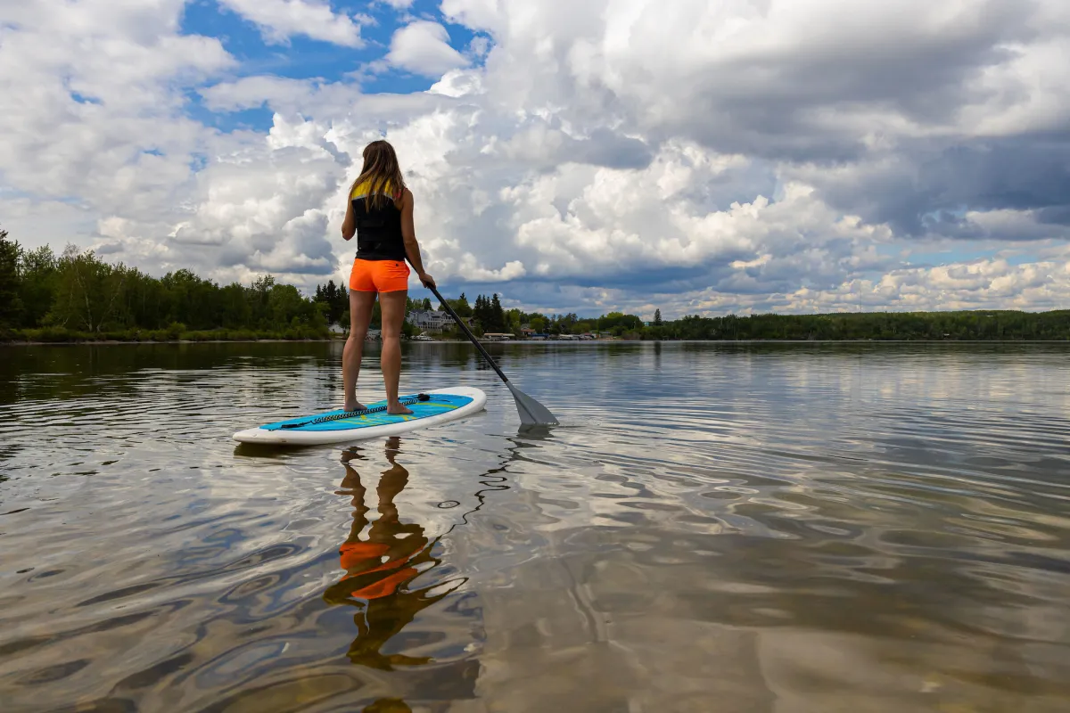 Paddleboarding on Moose Lake, from Vezeau Beach M.D. Park., Bonnyville, AB.