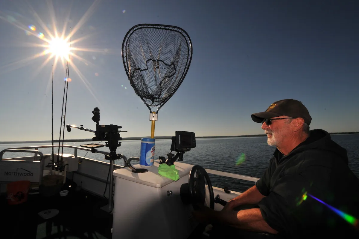 A couple prepare to fish on Cold Lake