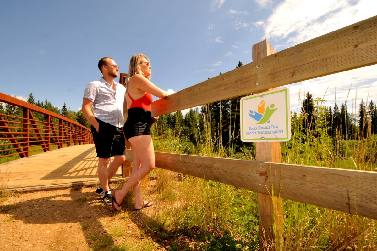 A couple go for a walk in Athabasca