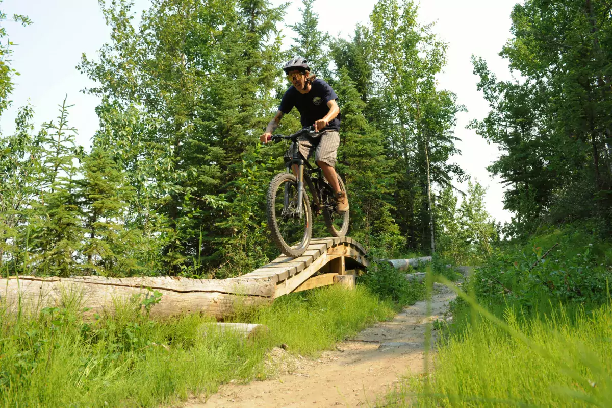 Logride in the South Bear Creek bike park trails, Grande Prairie, AB.