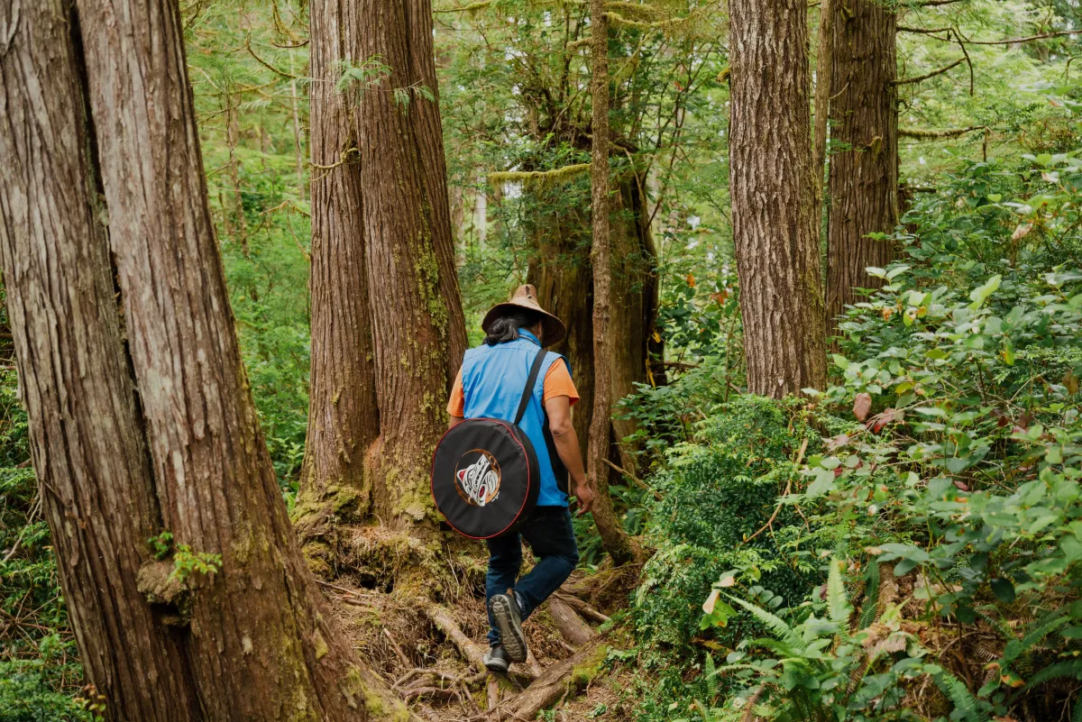 Touring the Kiixin historic site, Huu-ay-aht First Nations, BC.