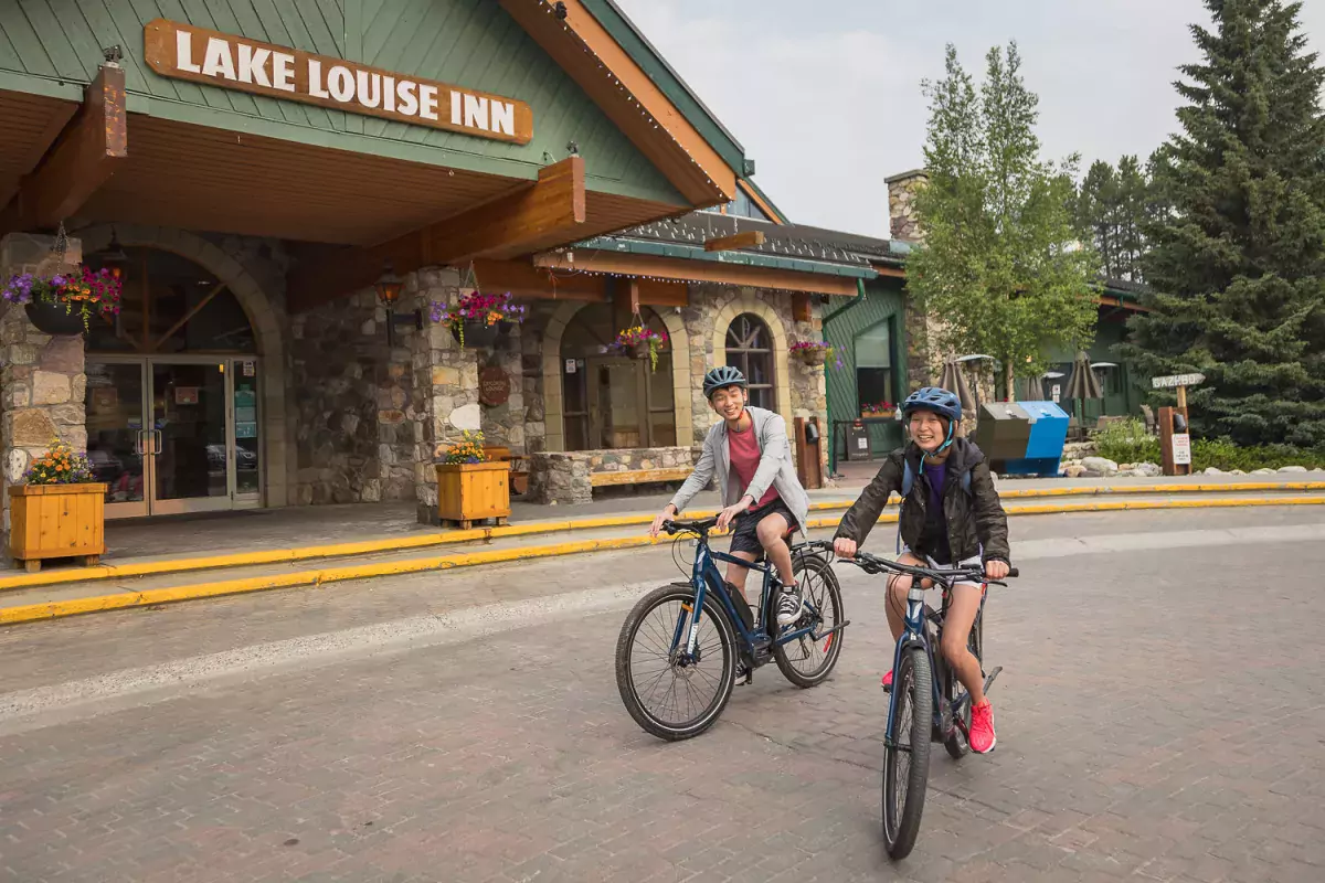 Riding bikes at Lake Louise Inn, Lake Louise, AB.