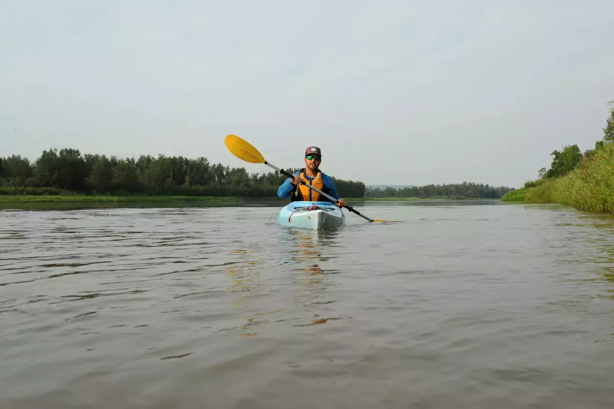 Kayaking the Smoky River near Peace River, AB.