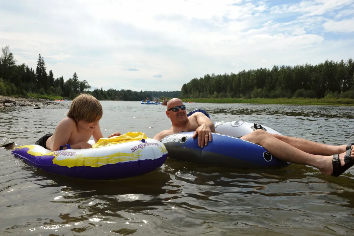 Tubing down the McLeod River near Whitecourt, AB.