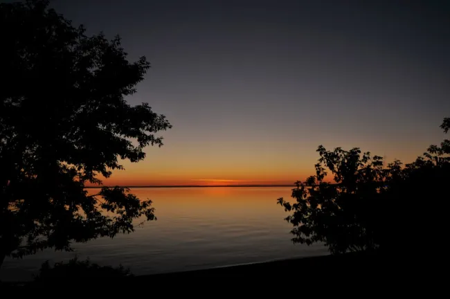 A photo of a sunset on Cold Lake