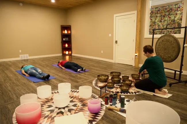 Singing bowl therapy session at Lighten Up Therapy in Vermilion, Alberta