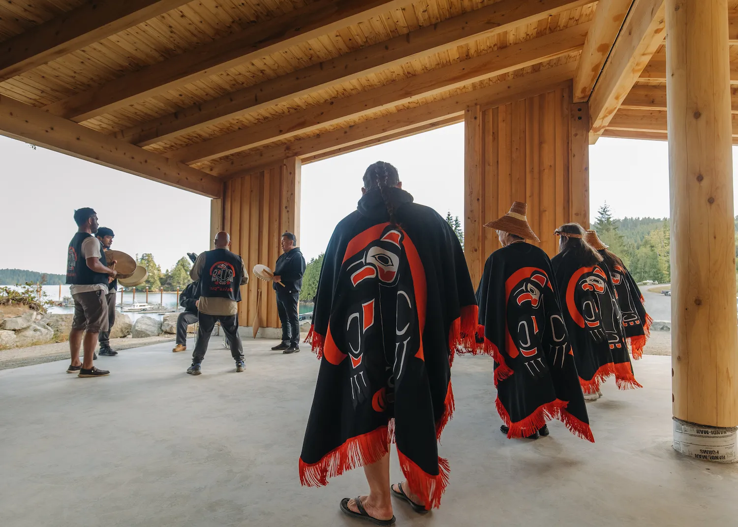 Toquaht Nation members singing "The Paddle Song" Singing "The Paddle Song" Secret Beach welcoming Space