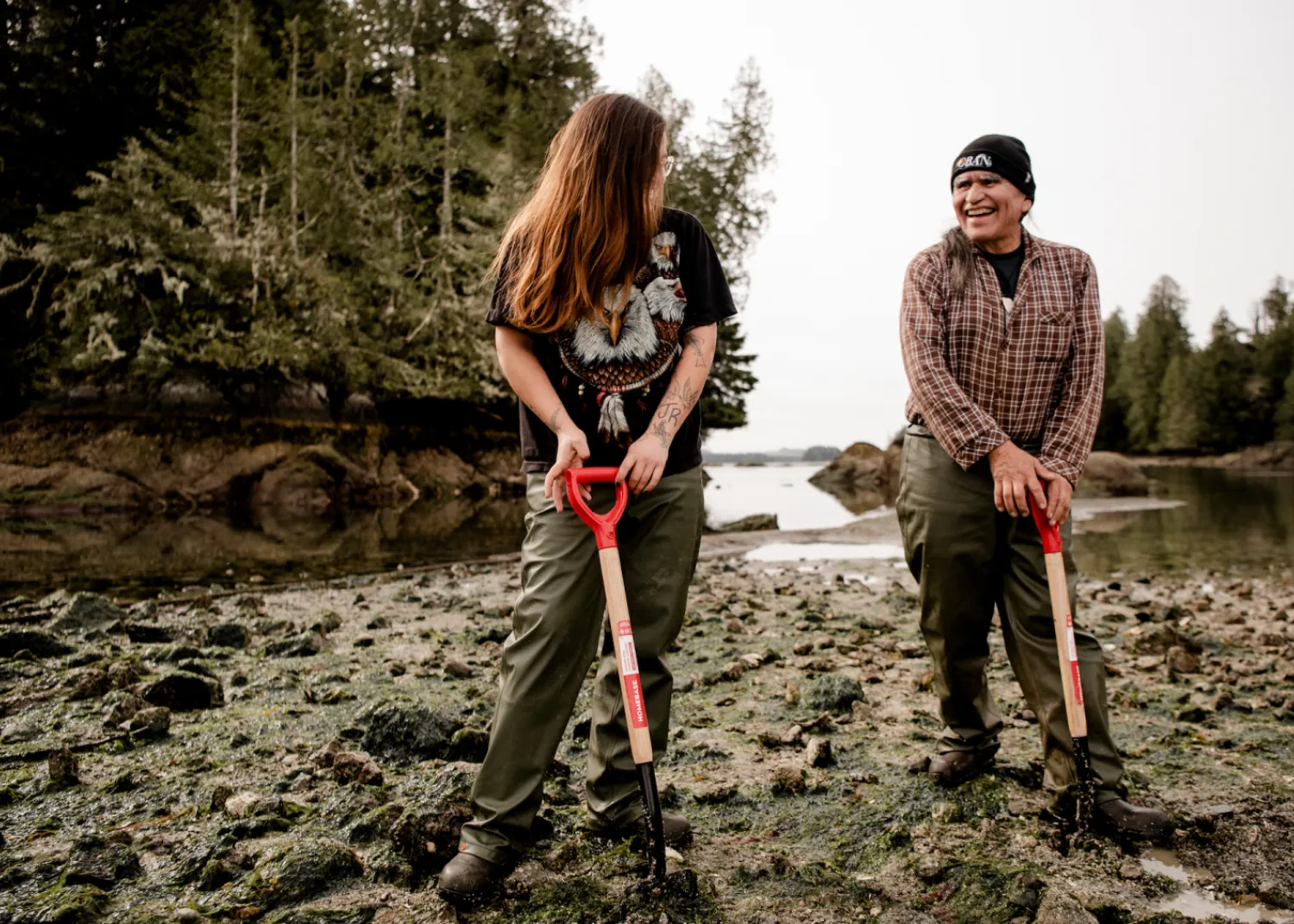 Sharing a laugh while digging oysters.
